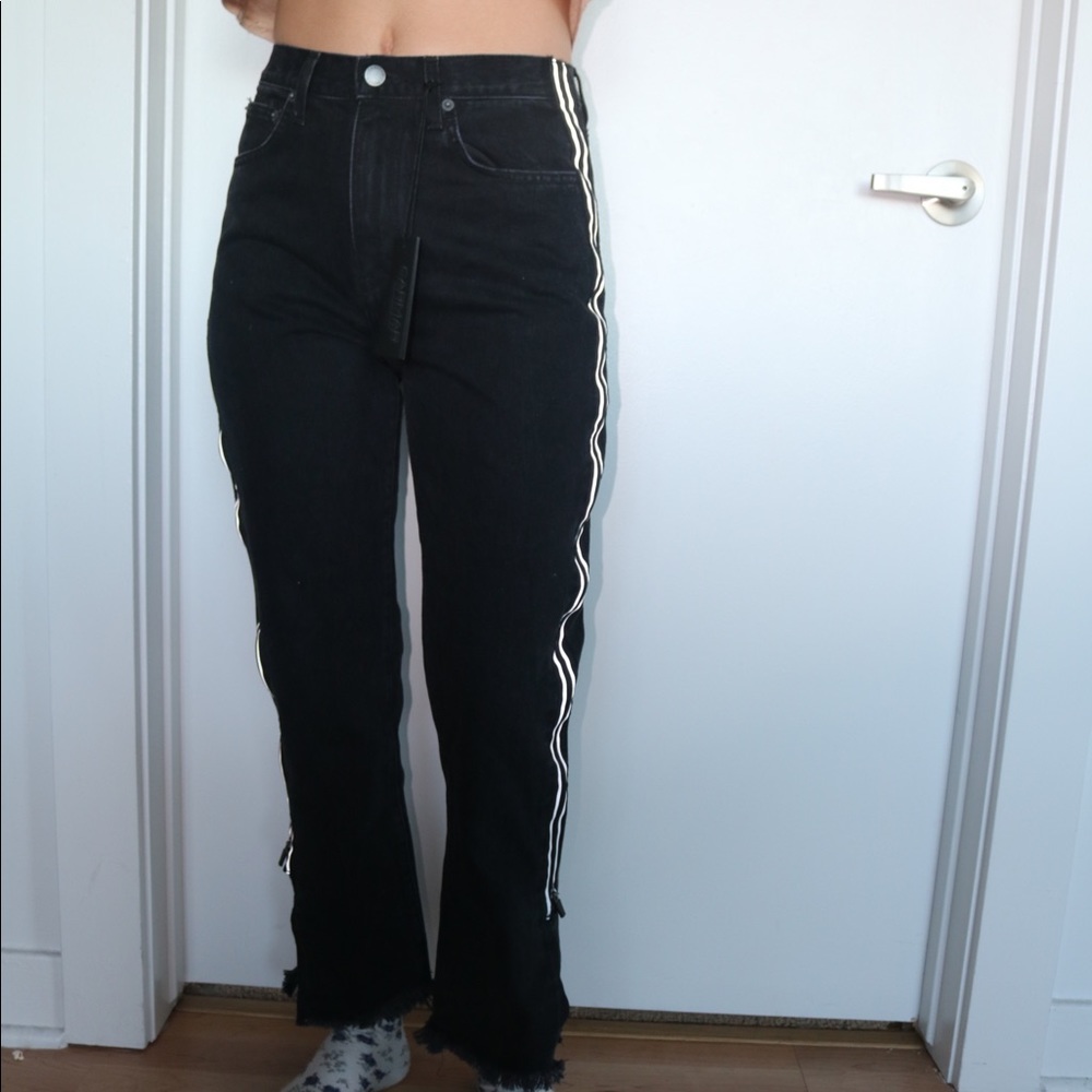 Black denim jeans with zippers